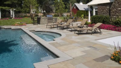 Best Pool Pavers: Brick vs. Stone vs. Concrete Pavers