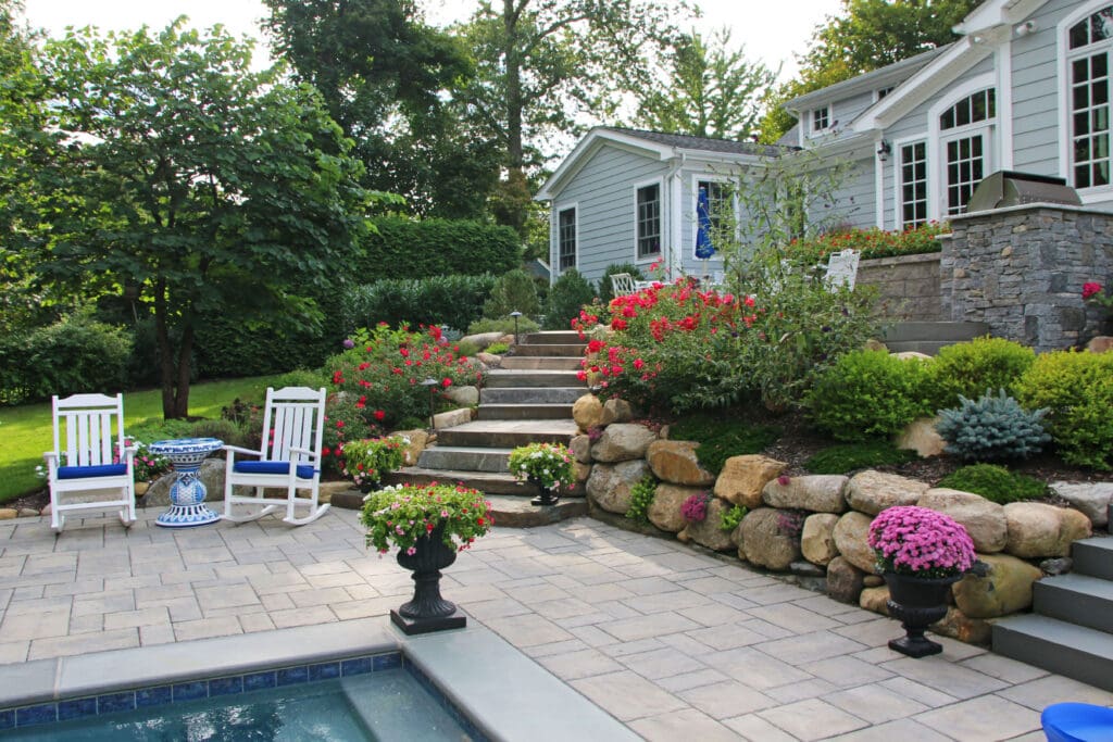 Elegant backyard landscape design in Essex Fells by Borst Landscape & Design