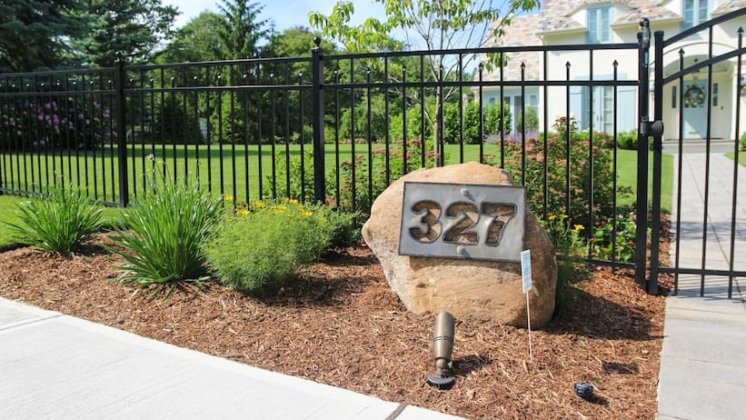 Native-style New Jersey garden with layered plantings, lawn, and mature trees.